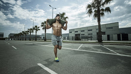 Build Upper Body Strength with These Sandbag Exercises